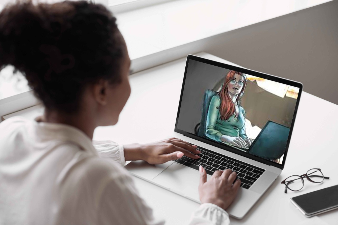 Woman looking at Oracle illustration on a screen