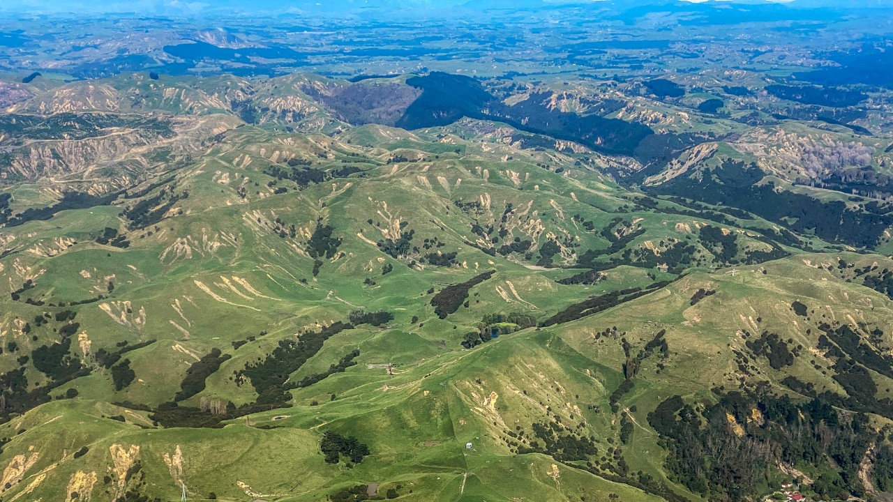 An aerial view of the hills near Eskdale, with many slips visible.