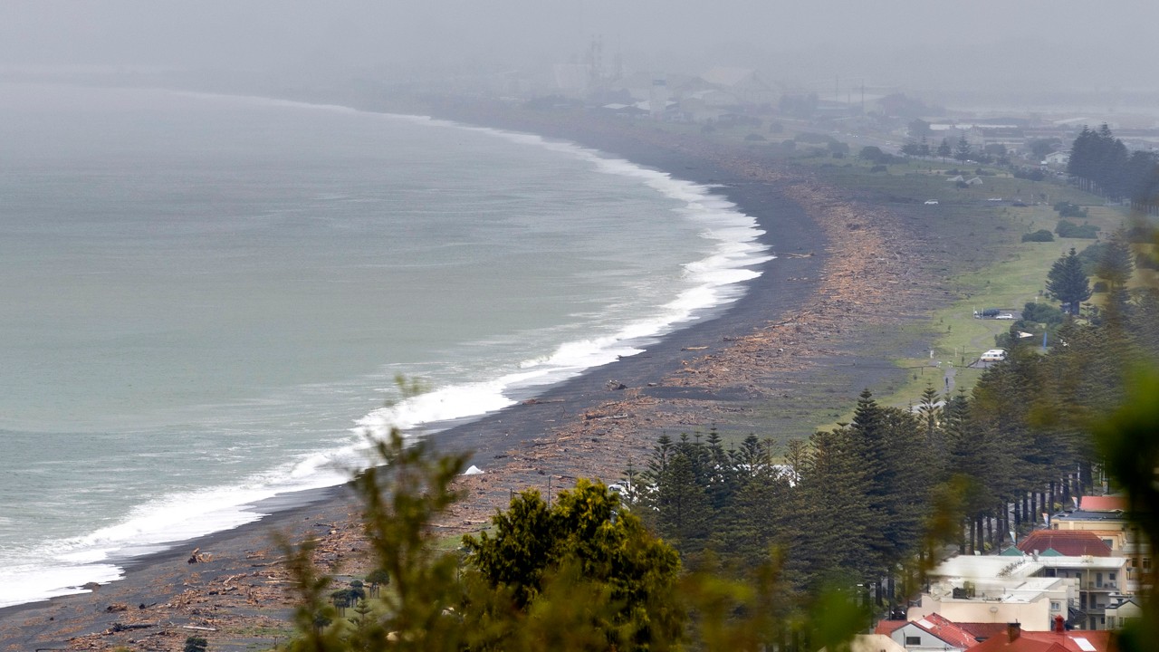 A photo from the Bluff Hill Lookout in Napier, looking south down Marine Parade, shows the vast amount of debris washed out to sea by Cyclone Gabrielle.