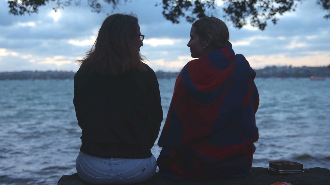 Victoria and Tamsyn share a moment after a swim in Auckland.