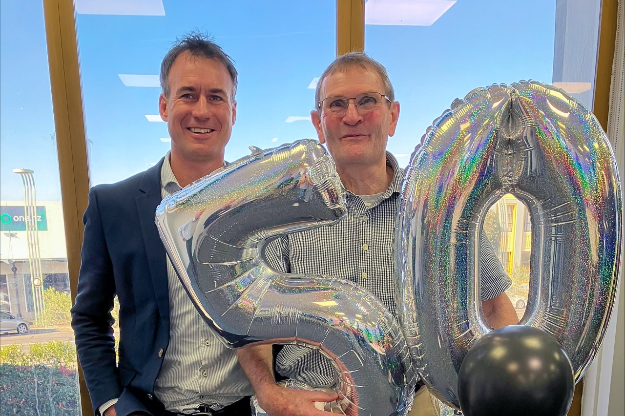 Roger Fannin, right, at his 50th work anniversary celebration, with ANZ Regional Manager, Business Marcus Bousfield.